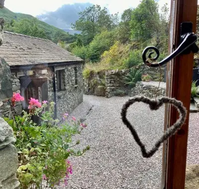 a heart drawn on the door of a window at Crookabeck B&B in Patterdale
