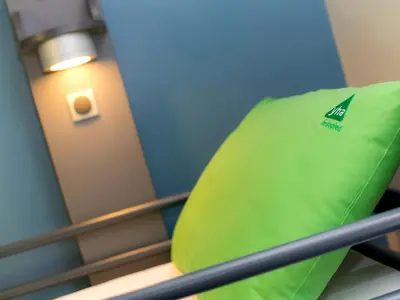 a green surfboard sitting on top of a bunk bed at YHA Wasdale Hall in Nether Wasdale