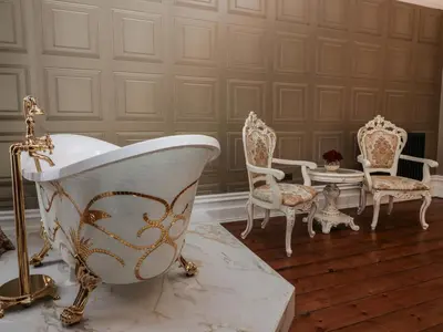 a bathroom with a tub and chairs and a table at Beechgrove Manor in Workington