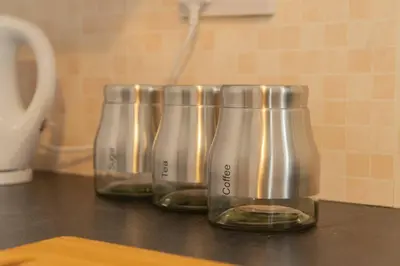 three metal containers sitting on top of a counter at CS House in Carlisle