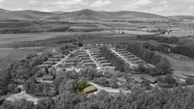 an aerial view of a village in the hills at Newsham Lodge in Ellonby