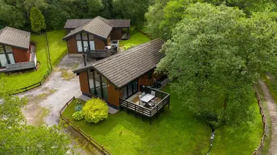 an overhead view of a house in the woods at Newsham Lodge in Ellonby