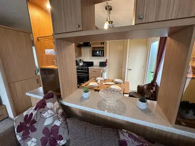 an aerial view of a kitchen and living room at The Cosy Hedgerow in Port Carlisle