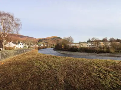 a view of a river with houses and a town at Lakeland View Lodge in Keswick