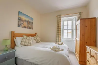 a bedroom with a bed and a window at 3 Bed in Drummore oc-p30213 in Drummore