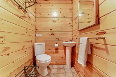 a bathroom with a toilet and a sink at 3 Bed in Kippford oc-g30100 in Kippford