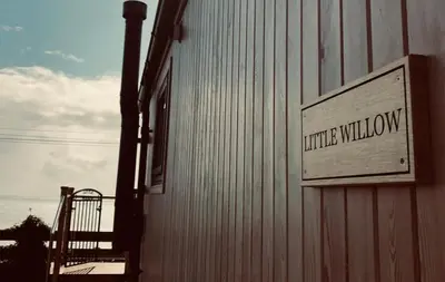 a sign on the side of a building at Little Willow in Gatehouse of Fleet