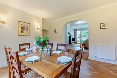 a dining room with a wooden table and chairs at 3 Bed in Loweswater oc-w30224 in Loweswater