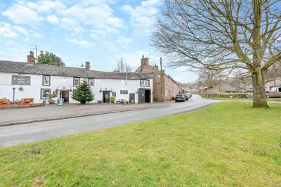 a house on the side of a road at 2 Bed in Greystoke oc-s30412 in Greystoke