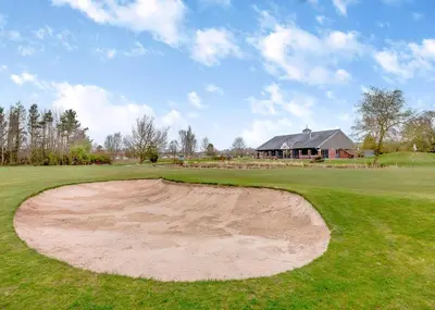 a sand bunker on a golf course at Eden Lodge Retreat in Crosby