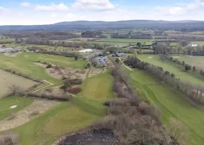 an aerial view of a golf course at Eden Lodge Retreat in Crosby