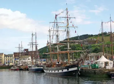 a group of boats docked in a harbor at Omega Apartment - 3 Bedrooms - Sleeps 5 in Whitehaven