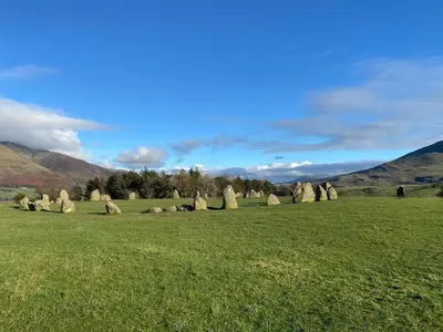 a group of hay bales in a field at Cosy home in centre of Lake District National Park in Chapel Stile