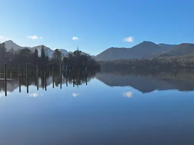 a view of a lake with mountains in the background at Field House in Keswick