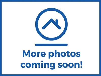 a sign that says more photos coming soon at Field House in Keswick