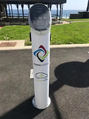 a parking meter sitting in the middle of a street at isle of man holiday apartment in Douglas