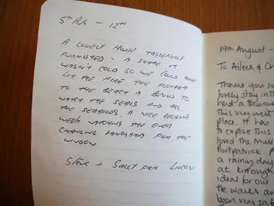 a page of a book with handwriting on it at Ardwell House East Lodge in Stranraer