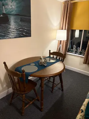 a room with a table and two chairs at Maryport town centre cosy home in Maryport