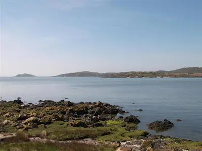 a large body of water with a bunch of rocks at Lonsdale in Rockcliffe
