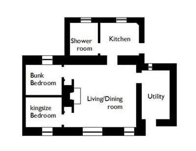 a black and white floor plan of a house at Meadow Cottage in Girthon