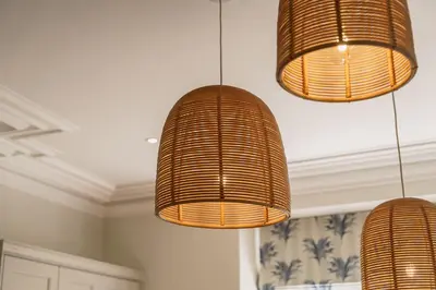 three pendant lights hanging from a ceiling in a kitchen at Leathes Head Country House in Keswick