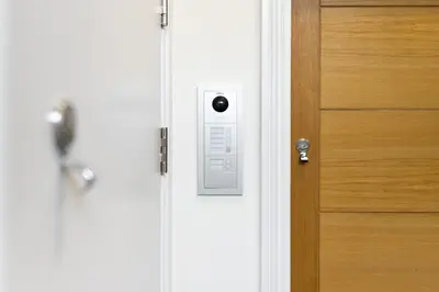 an open door with a door knob next to a wooden door at 8 Clifton Terrace in Douglas