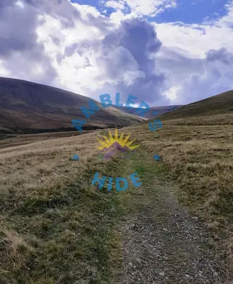 a grassy field with the words bike ride on it at Amblers Hide, Brigham, Cockermouth, Cumbria in Cockermouth