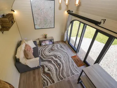 an aerial view of a living room in a tiny house at Longlands Lodge in Wigton