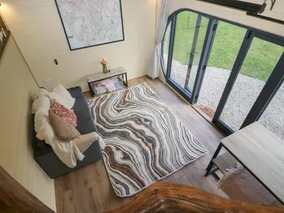 an aerial view of a living room with a zebra rug at Binsey Lodge in Wigton