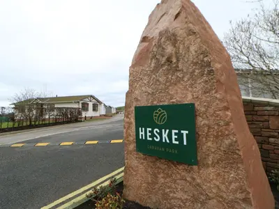 a sign for a heiselhaven park on the side of a road at New Horizon in Carlisle