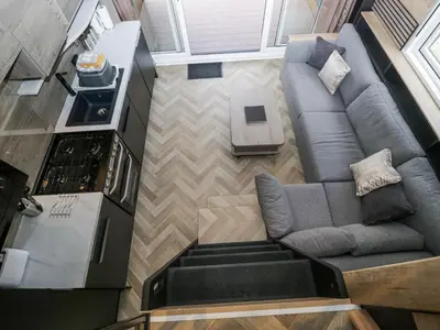 an overhead view of a living room with a couch at Lingy Luxury Family Pod in Keswick