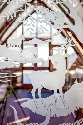 a paper cut out of animals on a chandelier at Villa Rabbie Burns Lodge by Interhome in Straiton