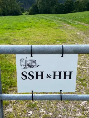 a sign on a fence that reads sith and hil at The Hidden Shepherds Hut- Off Grid Retreat in Castle Douglas