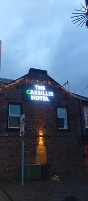 a sign on the side of a brick building at Hotel Room in Maybole for Work Travel & Leisure in Maybole