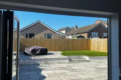 a view of a yard from a sliding glass door at 3 Bed-Sleeps 5-Garden-Parking-Pets in Carlisle
