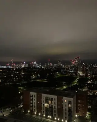a view of a city at night with lights at Welcome to Home Away From home in Moffat