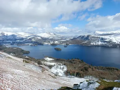 a view of crater lake in the snow at Catbells Sunrise Cottage Borrowdale Lake District in Keswick