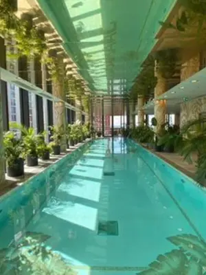 a large swimming pool in a large building at 2b2b skyline flat&amazing view! in Moffat