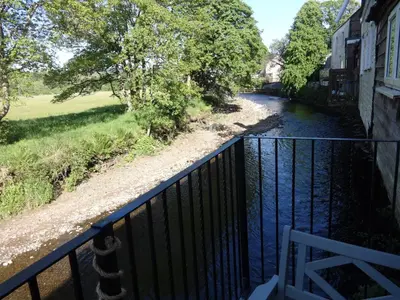 a view of a river from a balcony at Riverbank Cottage River Ehan Double Balcony in Egremont
