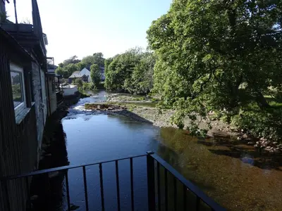 a view of a river from a balcony at Riverbank Cottage River Ehan Double Balcony in Egremont