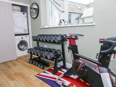 a room with a gym with a treadmill at Sunnycroft in Keswick
