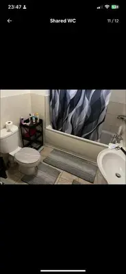 a bathroom with a toilet and a sink at Coven in Moffat