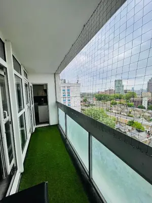 a balcony with a view of a city at Bow Church in Moffat