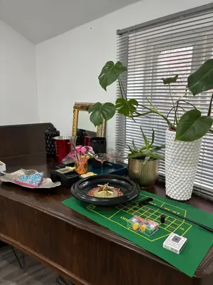 a table with a plate of food on it at Hertford detached home garden pet friendly parking in Moffat