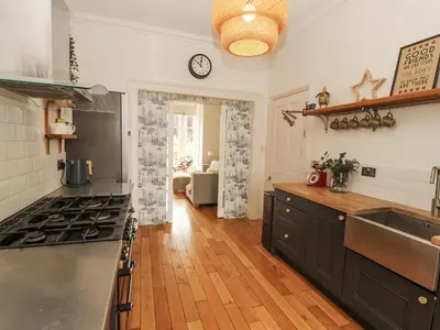 a kitchen with a sink and a stove top oven at 43 Station Road in Keswick