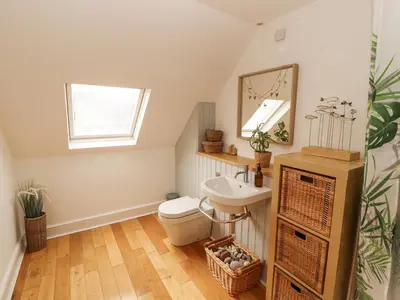 a bathroom with a sink and a toilet at 43 Station Road in Keswick