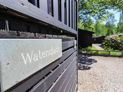 a sign on the side of a building at Watendlath in Keswick