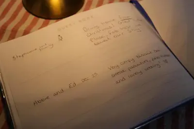 a piece of paper with handwriting on it at The Biscuit Box Ideal For Couples Or Families in Low Hesket