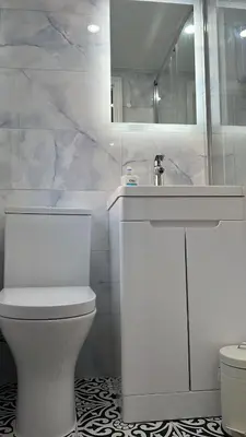 a white bathroom with a sink and a toilet at Love Shack - Cozy 1BR Walthamstow in Moffat