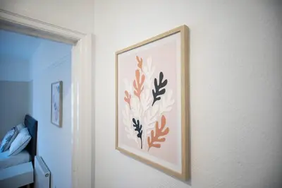 a picture hanging on a wall in a room at Saint Nico in Carlisle
